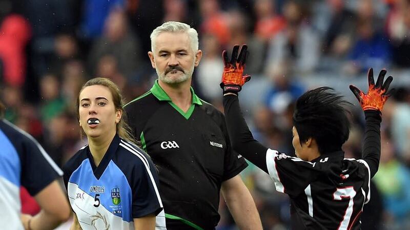 Paraic McGrath referees the match between Japan GAA Ladies (in black) and UCD International Ladies in an invitational match on August 5th, 2017 in Croke Park.