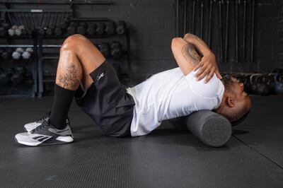 The shoulder-blade roll. Photograph: Monica Dzik/The New York Times