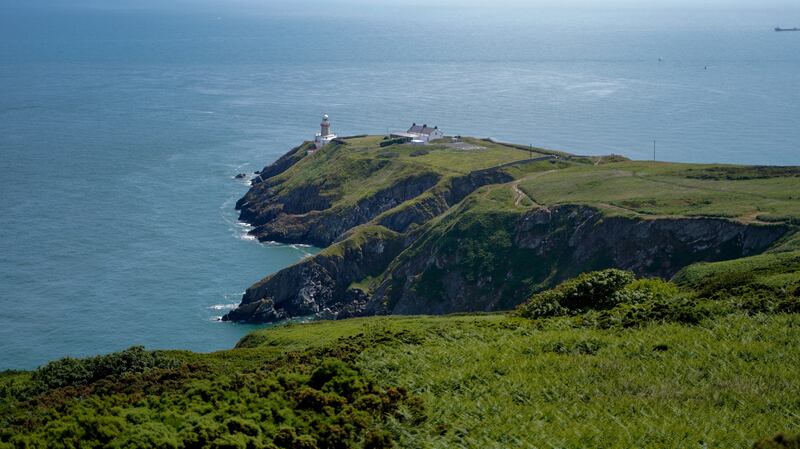 The Baily lighthouse, seen from Howth Head summit, is near another of McGinley’s favourite haunts, the public golf course at Deerpark, on the grounds of Howth Castle