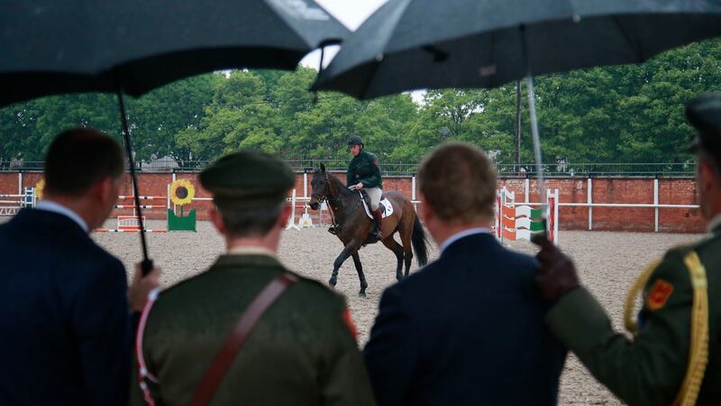 Enda Kenny and entourage at the arena in McKee Barracks. Photograph: Nick Bradshaw