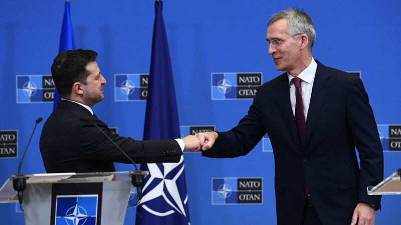 Nato secretary general Jens Stoltenberg greets Ukrainian president Volodymyr Zelensky during a press conference. Photograph: John Thys/AFP via Getty