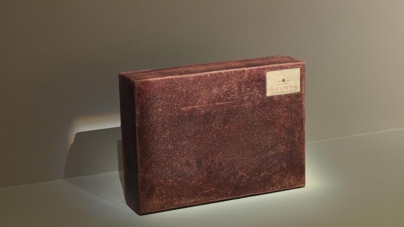 The cardboard ‘suitcase’ which contained Gilbert & George’s There Were Two Young Men (April 1971). Photograph: © Gilbert & George. Fondation Louis Vuitton / Marc Domage