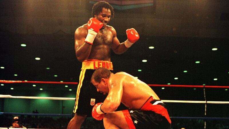Lennox Lewis stands over Tommy Morrison after flooring him in the sixth round of their  heavyweight bout in Atlantic City, New Jersey in October 1995. Photograph: Simon Bruty/Allsport