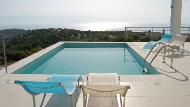 Greece: this modern white house in the Peloponnese has a good balance of balconies and terraces