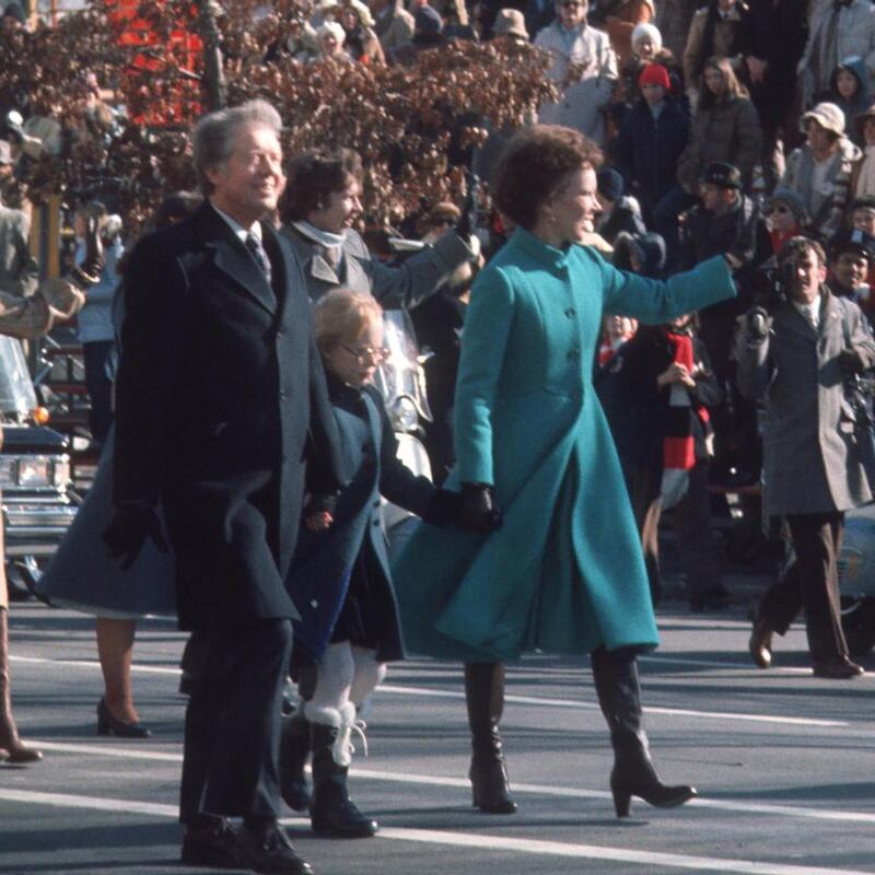 Following his inauguration, former US president Jimmy Carter and first lady  Rosalynn Carter walk Pennsylvania Avenue in Washington,      1977. Photograph: Ron Galella Collection/Getty