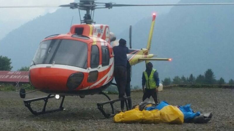 Bodies of climbers which were recovered from mountain being off loaded at Lukla airport.