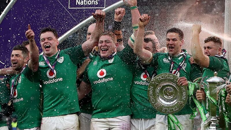 Tadhg Furlong celebrates Ireland’s Grand Slam victory after the win over England at Twickenham on St Patrick’s Day in 2018. Photograph: Bryan Keane/Inpho