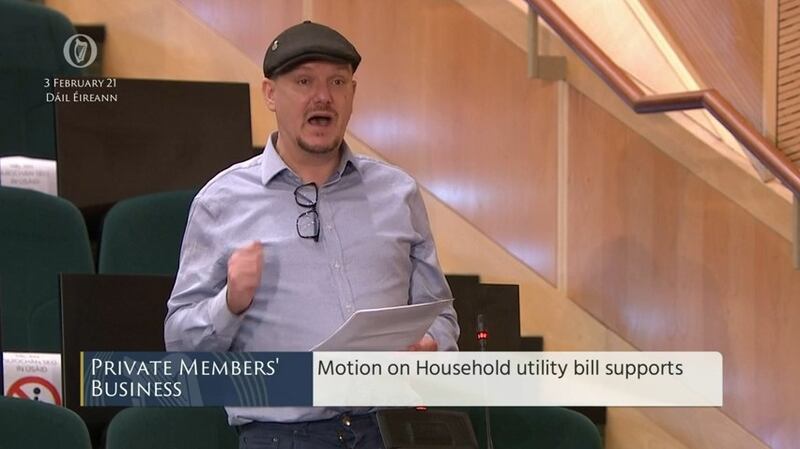 Sinn Féin TD Mark Ward sports his Healy-Rae style cap