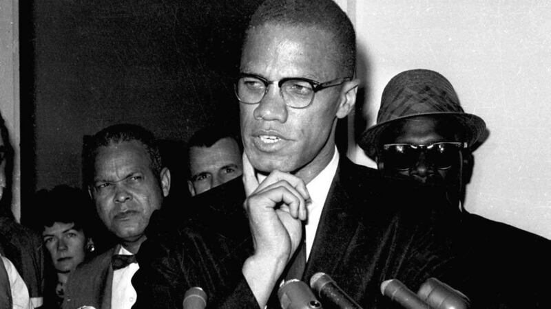 Malcolm X speaking to reporters in Washington in 1963. Photograph: AP