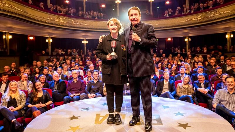 Derry artist Soak being presented with a European Border Breakers Award by Jools Holland at this year's Eurosonic festival