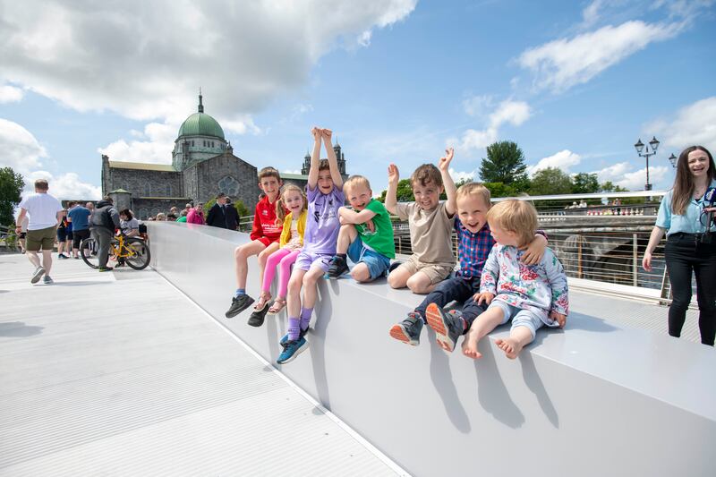 Children celebrate at the opening of the new pedestrian and cycle bridge in Galway city. Photograph: xposure