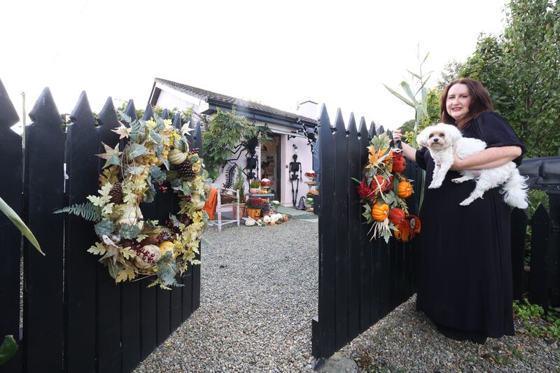 Emma Edmonds at the gates of her spooky home. Photograph: Nick Bradshaw