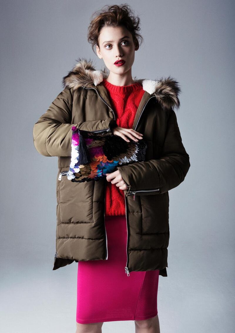 Padded zip hem parka €35, cable jumper €20 and sequin clutch €12,  all from Penneys.