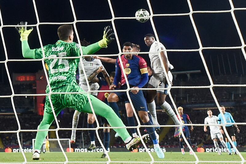 Inter Milan's Dutch defender Denzel Dumfries rises highest for his second to restore Inter's lead. Photograph: Joseo Laho / AFP

