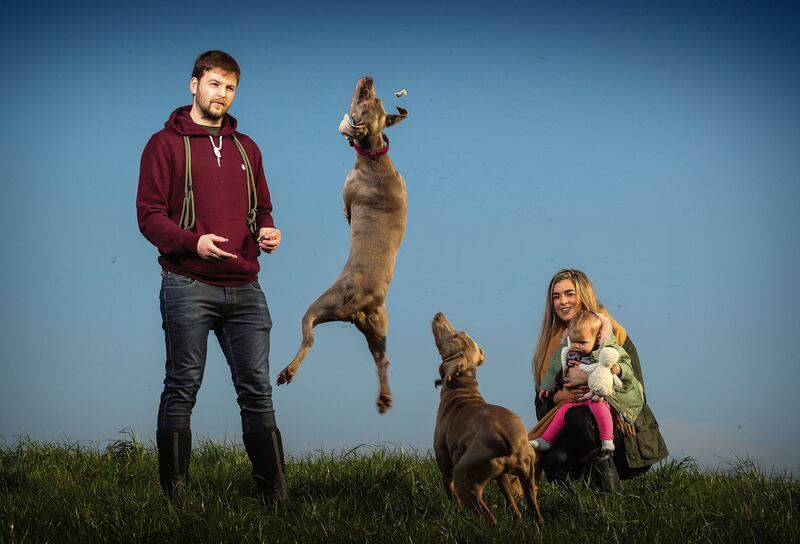 Ireland Rugby World Cup Portraits 2019 Iain Henderson with his wife Suzanne, daughter Lana and dogs Lola and Baily in his back garden near Belfast. Mandatory Credit ©INPHO/Billy Stickland