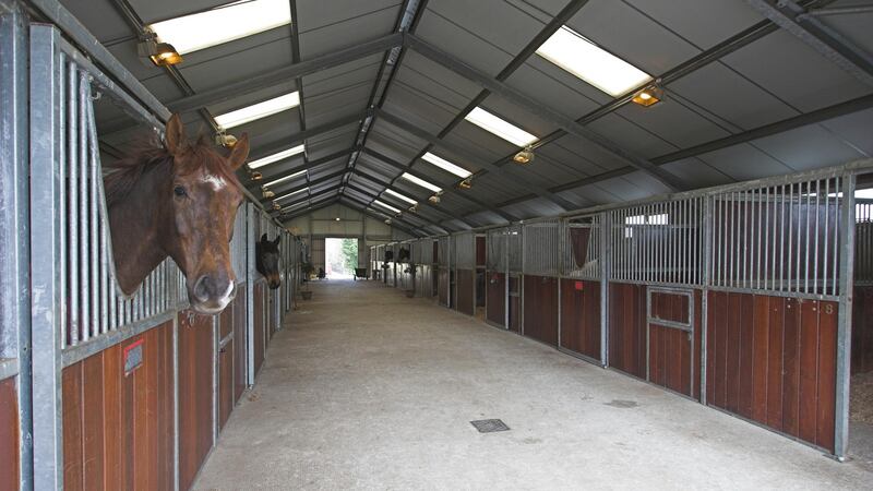 A 334sq m “American barn” a short distance from the back of the house includes 16 loose boxes.