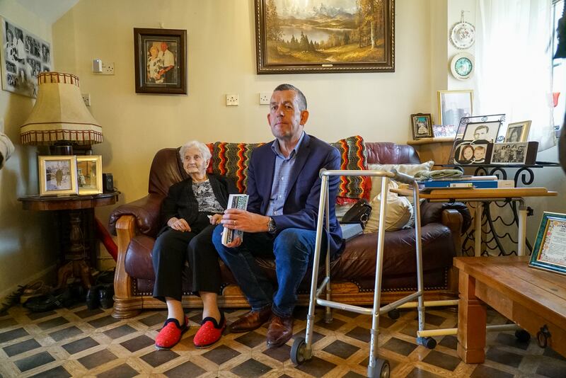 Elizabeth Lyons (101) welcoming the Sinn Féin candidate for Limerick mayor, Maurice Quinlivan, into her home. Photograph: Enda O'Dowd