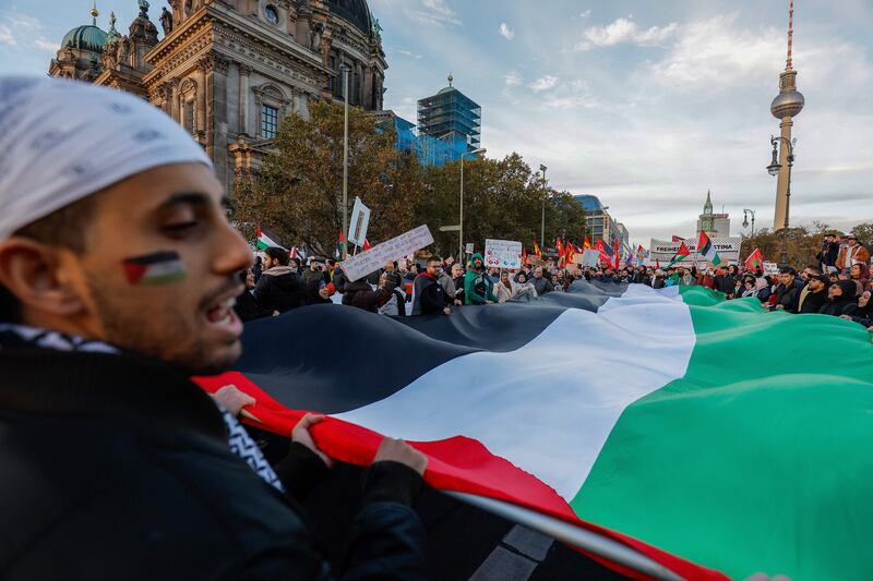 Demonstrators carry a giant Palestinian flag during a protest in support of Palestinians in Berlin in November. Photograph: Odd Andersen/AFP via Getty Images