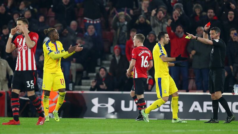 Andre Marriner sending off  Palace’s Wilfried Zaha  during the  match  against Southampton  at St Mary’s Stadium, Southampton.  Photograph:  Dan Istitene/Getty Images