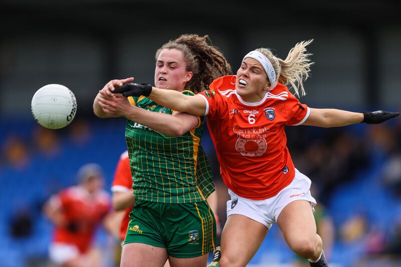Emma Duggan challenges Lauren McConville for the ball during Meath's clash with Armagh earlier this year in the championship. Photograph: Tom Maher/Inpho

