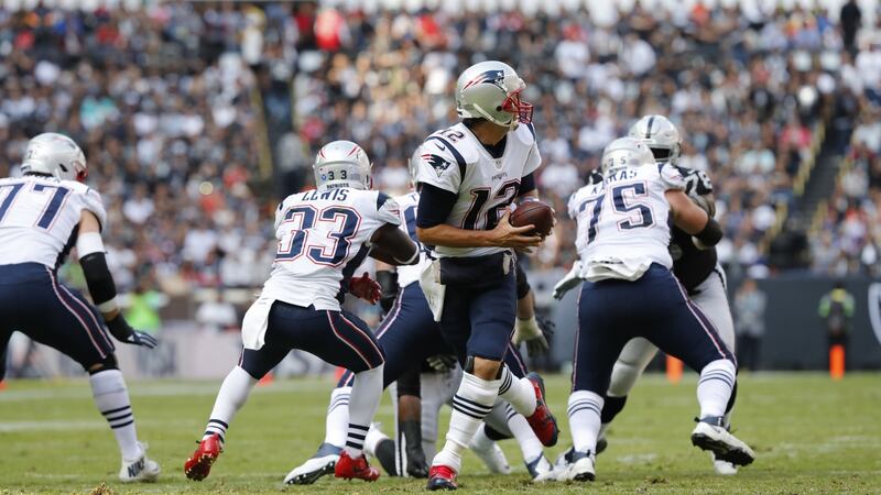 Tom Brady in action during the Patriots comfortable win over the Raiders. Photograph: Jorge Nunez/EPA