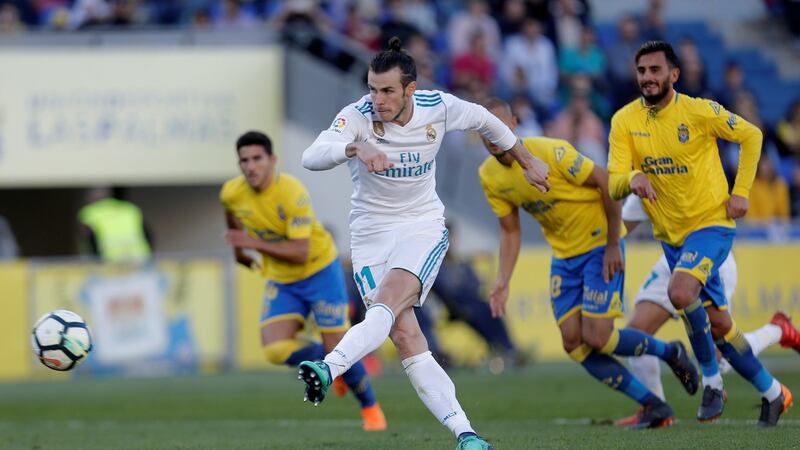 Real Madrid’s Gareth Bale scores their third goal from a penalty. Photograph: Santiago Ferrero/Reuters