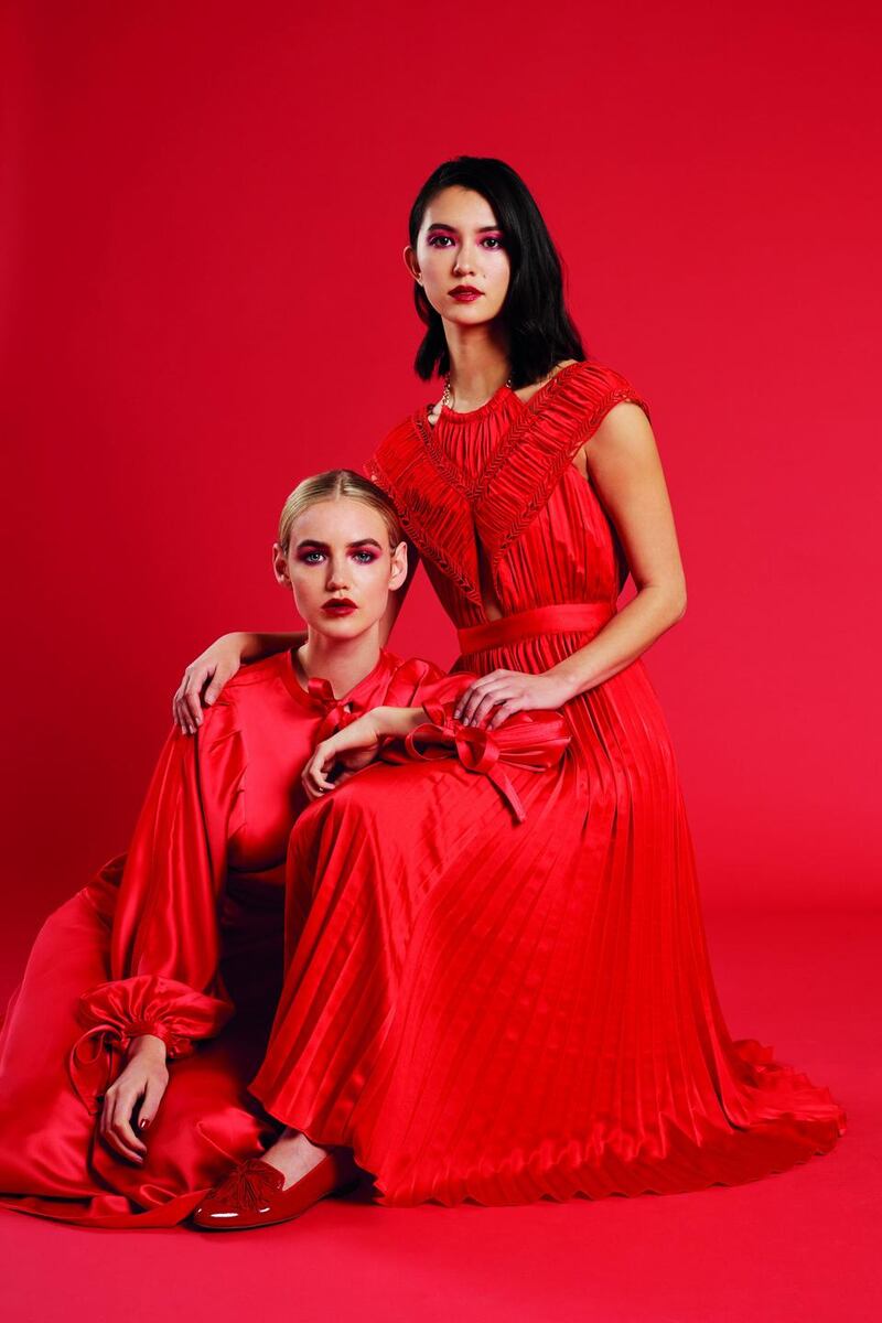 Crimson Christmas: Vanessa wears dress, €425, Self-Portrait. Li-Ann wears dress, €410, Self-Portrait; and shoes, €175, LK Bennett