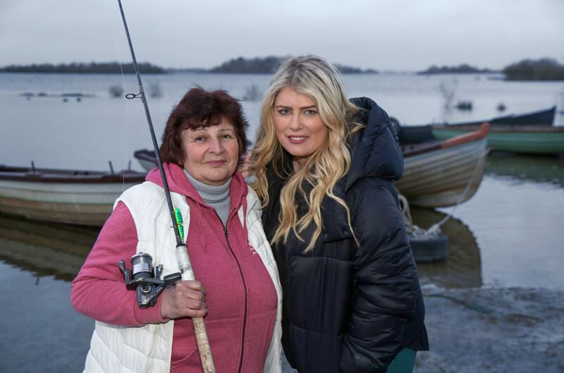 Olena Kaivmova from Ukraine with her host Bronwen O’Malley on the shore at Lough Corrib, where they have found a mutual love of fishing. Photograph: Joe O’Shaughnessy
