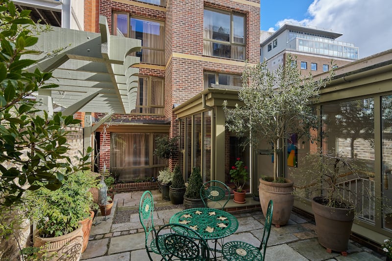 The extension and courtyard to the rear of Gardiner Lodge