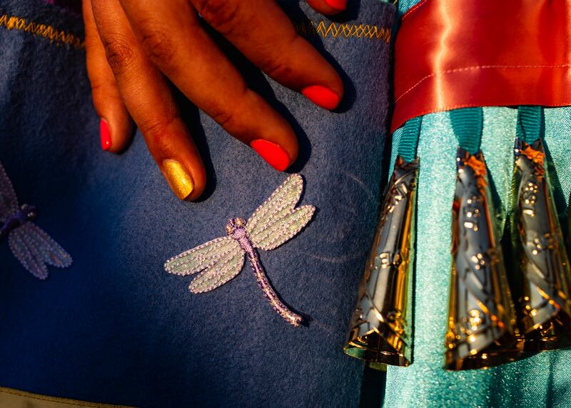 Dragonflies from a dance outfit that Cecilia Spencer outgrew now decorate a purse. Photograph: Tailyr Irvine/The New York Times