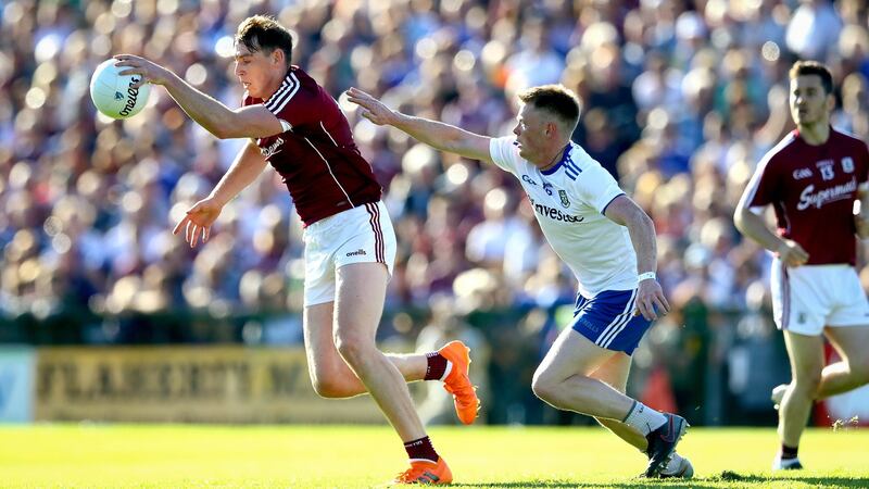Galway’s Thomas Flynn and Ryan McAnespie of Monaghan in action at Salthill. Photograph: Ryan Byrne/Inpho