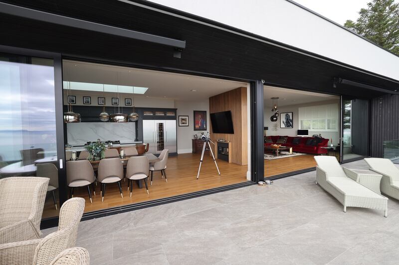 Kitchen and sittingroom opening on to terrace. Photograph: Dara Mac Dónaill 









