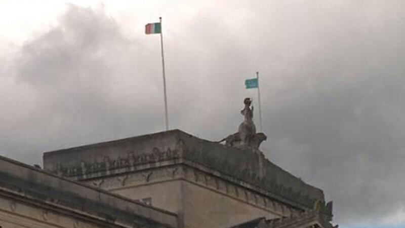 The Tricolour and another unsanctioned flag flying over Parliament Buildings at Stormont. Photograph: Winston Irvine/PUP/PA Wire