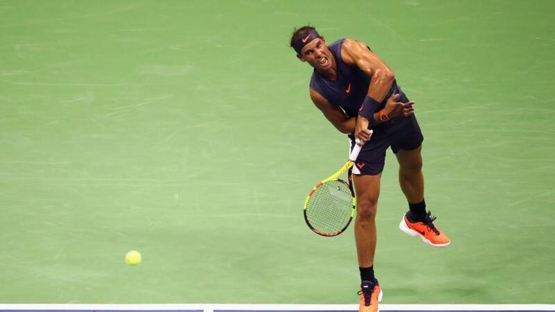 Nadal serves during his first round match against David Ferrer. Photo: Alex Pantling/Getty Images