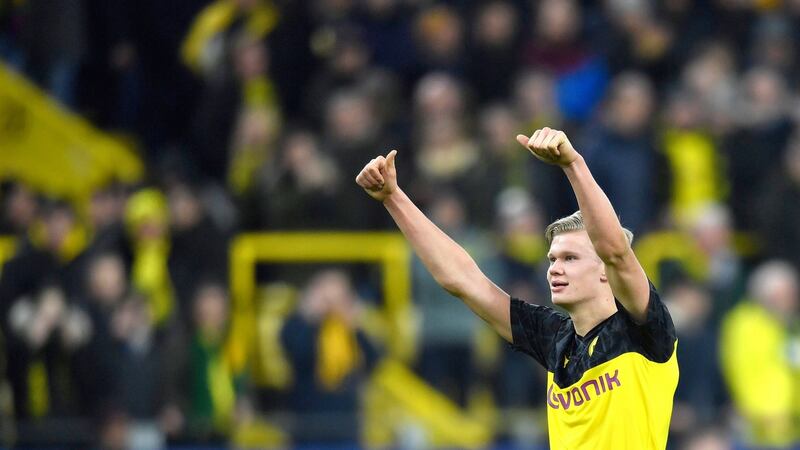 Erling Braut Haaland thanks the home fans after his team’s win over PSG. Photograph: AP