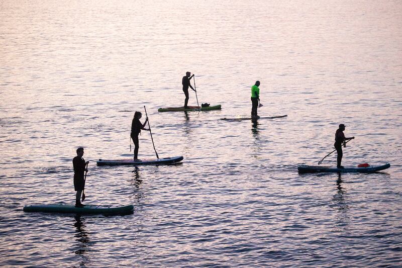 Paddle boarders at Darkness into Light 2024 in Howth, Dublin. Photograph: Tom Honan
