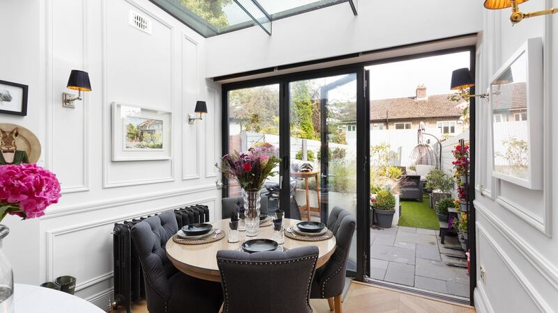 Newly panelled white painted walls.