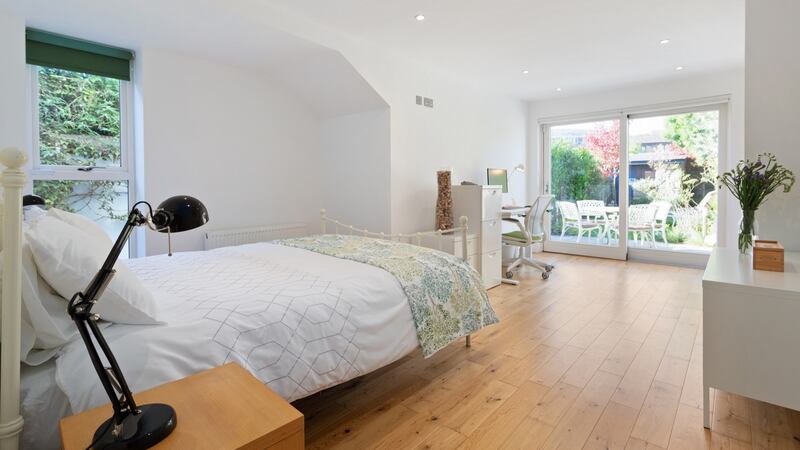 Dual-aspect bedroom/office opening to patio and garden