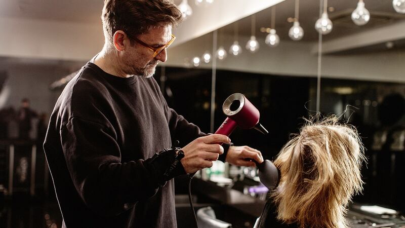Start your style with freshly washed hair and get it to around 80% dry before styling. 'The Dyson Supersonic is great,' says Bradshaw