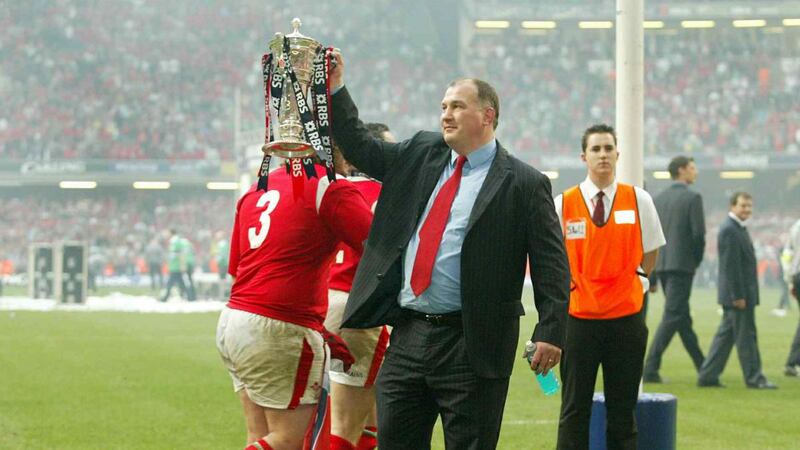 Welsh coach Mike Ruddock holds up the Six Nations Championship Trophy on March 19th, 2005. Photograph: Morgan Treacy/Inpho