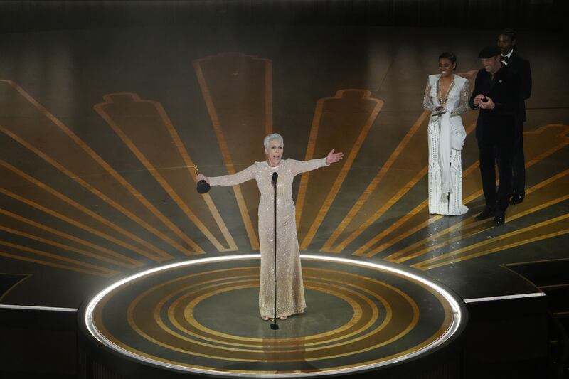 Oscars 2023: Jamie Lee Curtis accepts the award for best actress in a supporting role, for Everything Everywhere All at Once. Photograph: Todd Heisler/New York Times