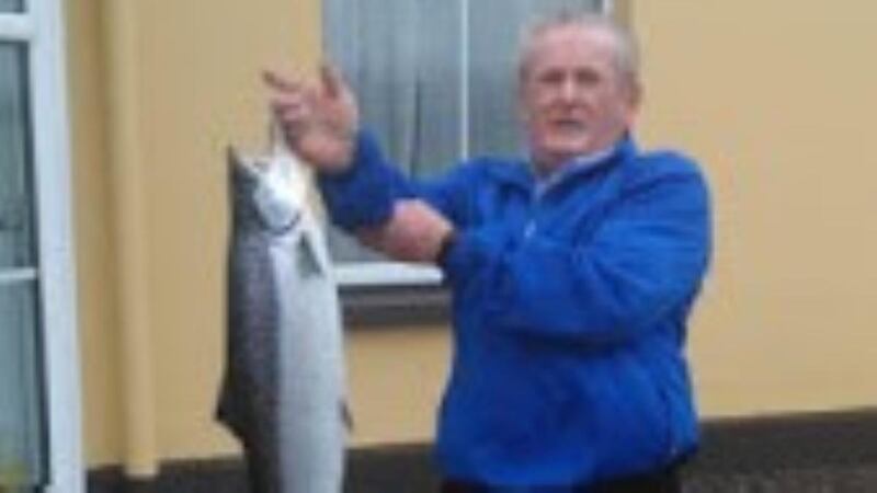 Local angler Kevin O’Shea with first salmon of 2020 in Ireland, caught in Butler’s Pool, Waterville, Co Kerry. Photograph: Vincent Appelby