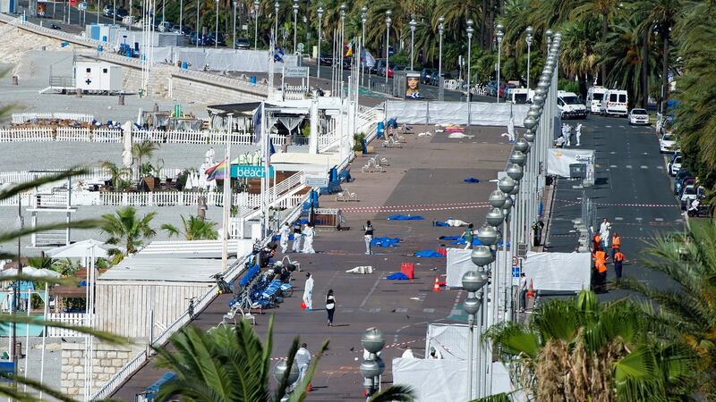 Crime scene investigators work on the ‘Promenade des Anglais’ after the truck crashed into the crowd during the Bastille Day celebrations in Nice. Photograph: EPA