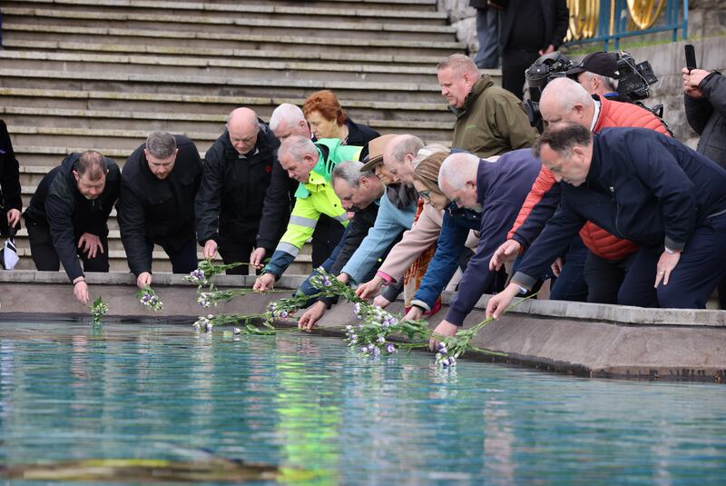 Remembering family and friends at Worker’s Memorial Day, a day dedicated to remembering workers who have lost their lives, been injured or contracted illnesses at or because of work, held in the Garden of Remembrance, Parnell Square, Dublin. Photograph: Dara Mac Dónaill / The Irish Times