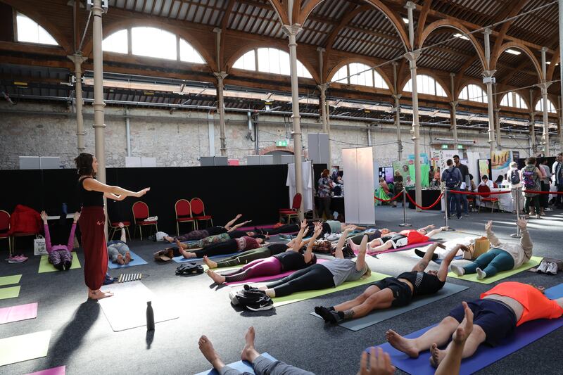 Yoga teacher and wellbeing coach Anna Przybylo during a session in the RDS over the weekend. Photograph: Nick Bradshaw 