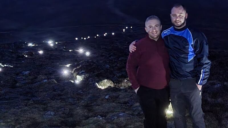 Craig Ballentine and partner Sean Morgan making final preparations for a night-time Climb with Charlie trek in the Cooley Mountains on Saturday. Photograph: Brian Hutton