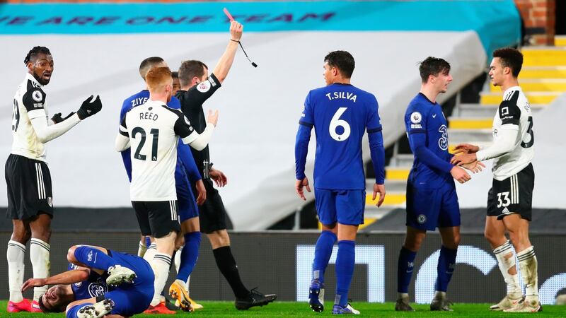 Fulham’s Antonee Robinson is sent off during his side’s defeat to Chelsea. Photograph: Clive Rose/EPA