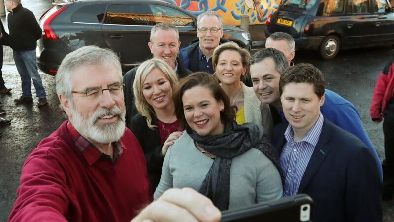 Gerry Adams takes a selfie with successor Mary Lou McDonald and many of the party’s other leaders including  Michelle O’Neill, Gerry Kelly, Pearse Doherty and Matt Carthy. Photograph: Niall Carson/PA