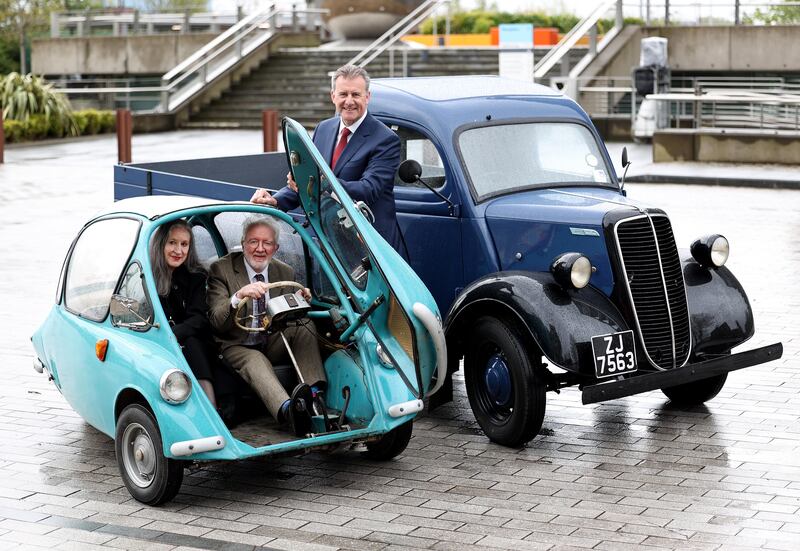 Minister of State for Heritage Malcolm Noonan behind the wheel of a vintage "bubble car" - the same make exported through Dublin Port in the 1960s - with Barry O’Connell, chief executive at Dublin Port Company and historian Catriona Crowe at the launch of the port's heritage conservation strategy. Photograph: Robbie Reynolds