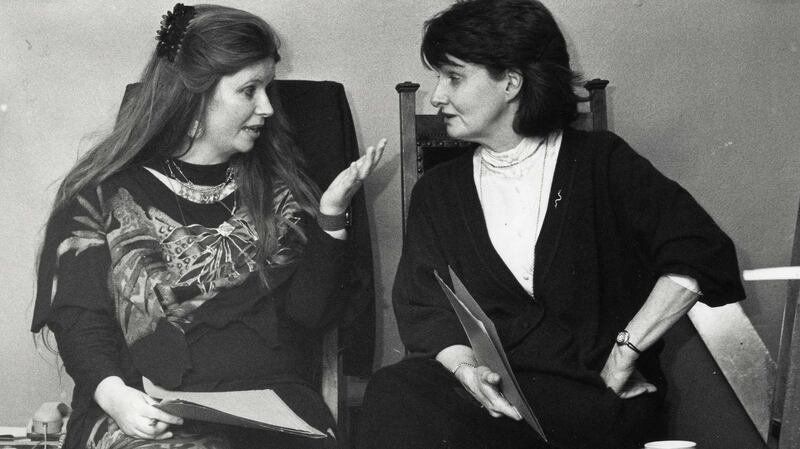 Poets Nuala Ní Dhomhnail (left) and Eavan Boland at the Mna na hEorpa poetry reading celebration by Irish women poets marking the occasion of International Women’s Day in the Abbey Theatre attended by President Mary Robinson in 1992. Photograph: Matt Kavanagh